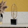 Golden Celestial Harmony Metal Table Sculpture – A Radiant Fusion of Art and Elegance
